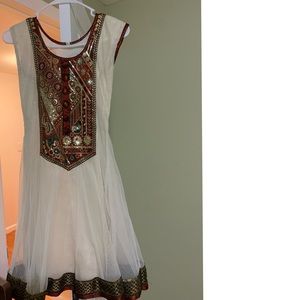 White sari work sparkly dress with maroon tights